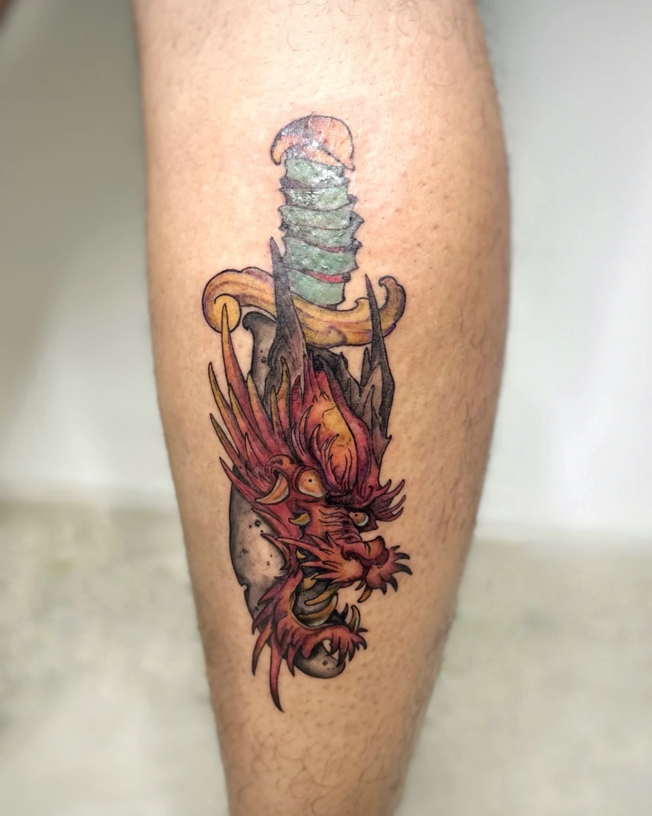 Tattoo bunga ungu di kaki · Meigu Tattoo